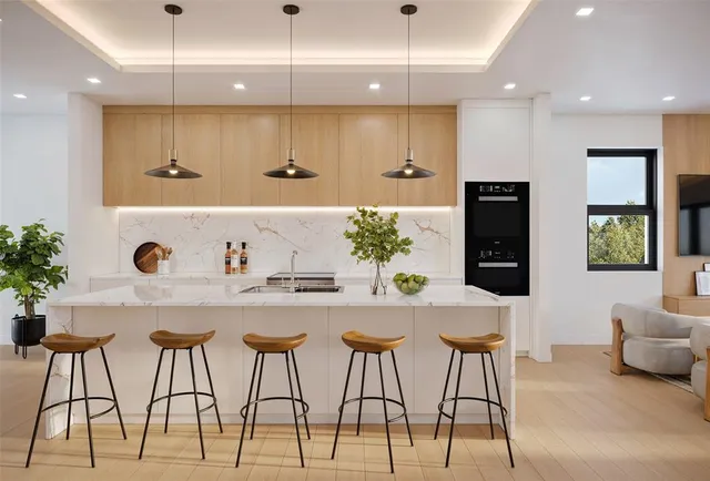a kitchen with a table and chairs in it