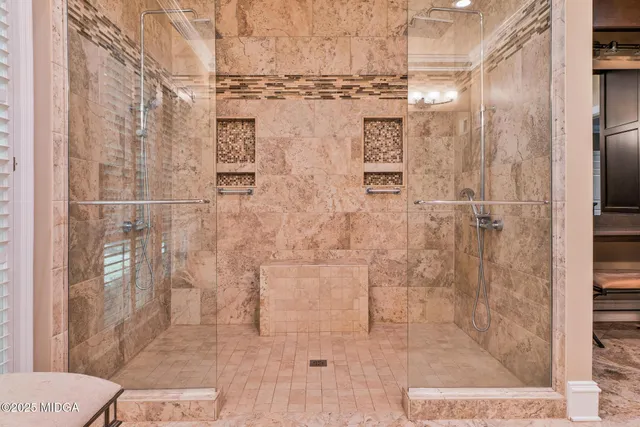 a bathroom with a sink toilet and mirror