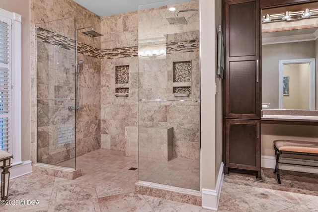 a kitchen with a refrigerator and a stove