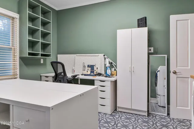 a view of a room with wooden walls