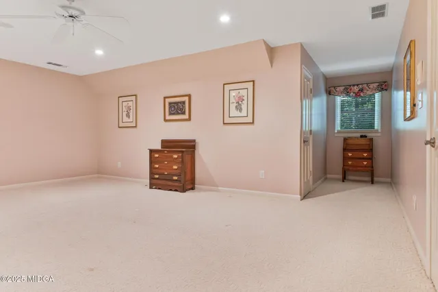 a view of a balcony with wooden floor