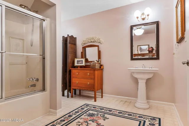 a view of livingroom with hardwood floor and a ceiling fan
