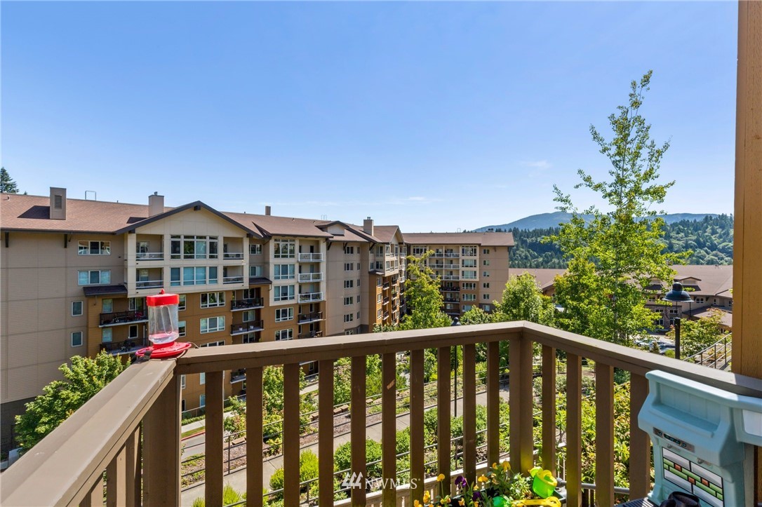 130 Cougar Ridge Road Northwest, Unit 1502 Issaquah, WA 98027 - Photo 8 of 28 a view of a houses from deck