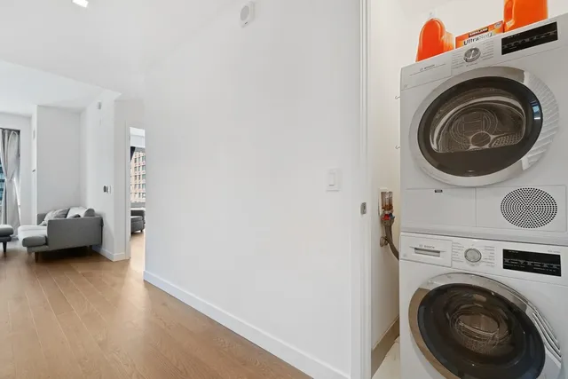a view of livingroom with washer and dryer