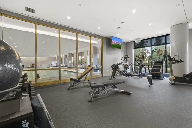 a view of a room with gym equipment