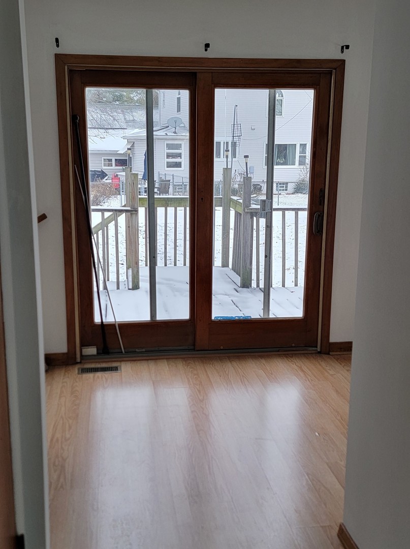 63 West Richton Road Steger, IL 60475 - Photo 11 of 48 a view of front door with wooden floor