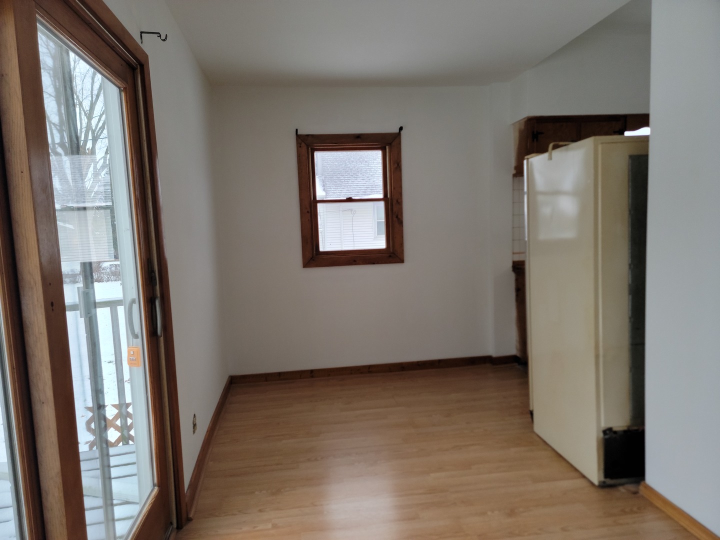 63 West Richton Road Steger, IL 60475 - Photo 14 of 48 a view of an empty room with wooden floor and a window