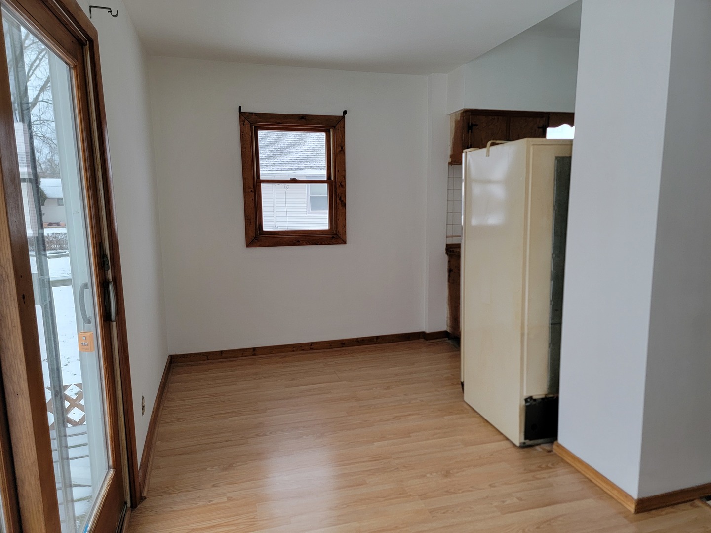 63 West Richton Road Steger, IL 60475 - Photo 19 of 48 an empty room with wooden floor and a window