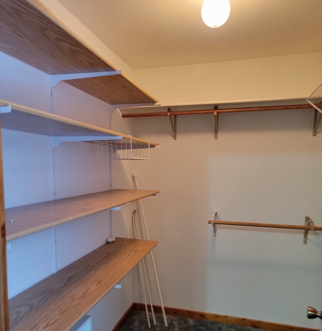 63 West Richton Road Steger, IL 60475 - Photo 23 of 48 a view of a room with racks on the wall