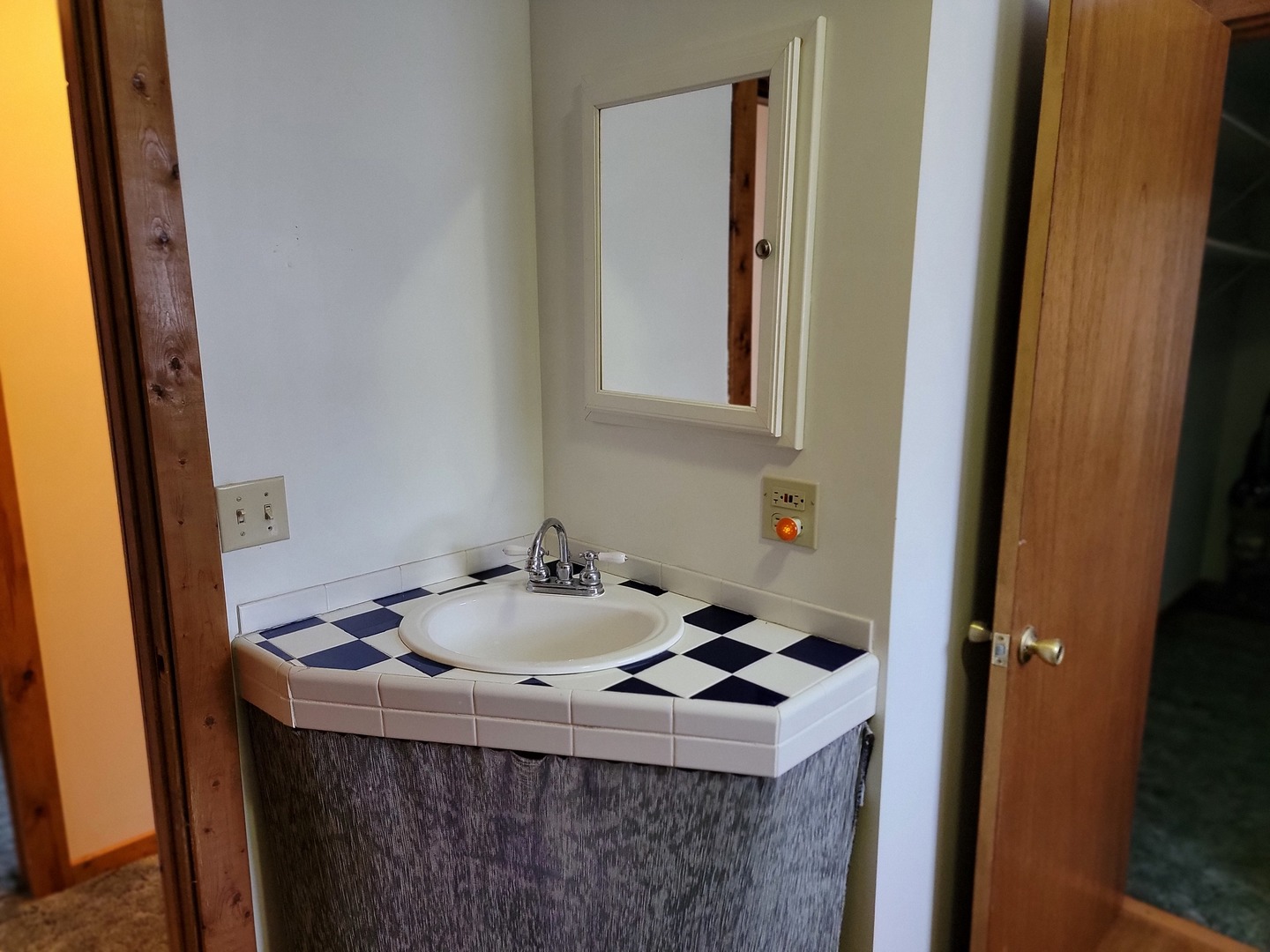 63 West Richton Road Steger, IL 60475 - Photo 29 of 48 a bathroom with a sink and a mirror