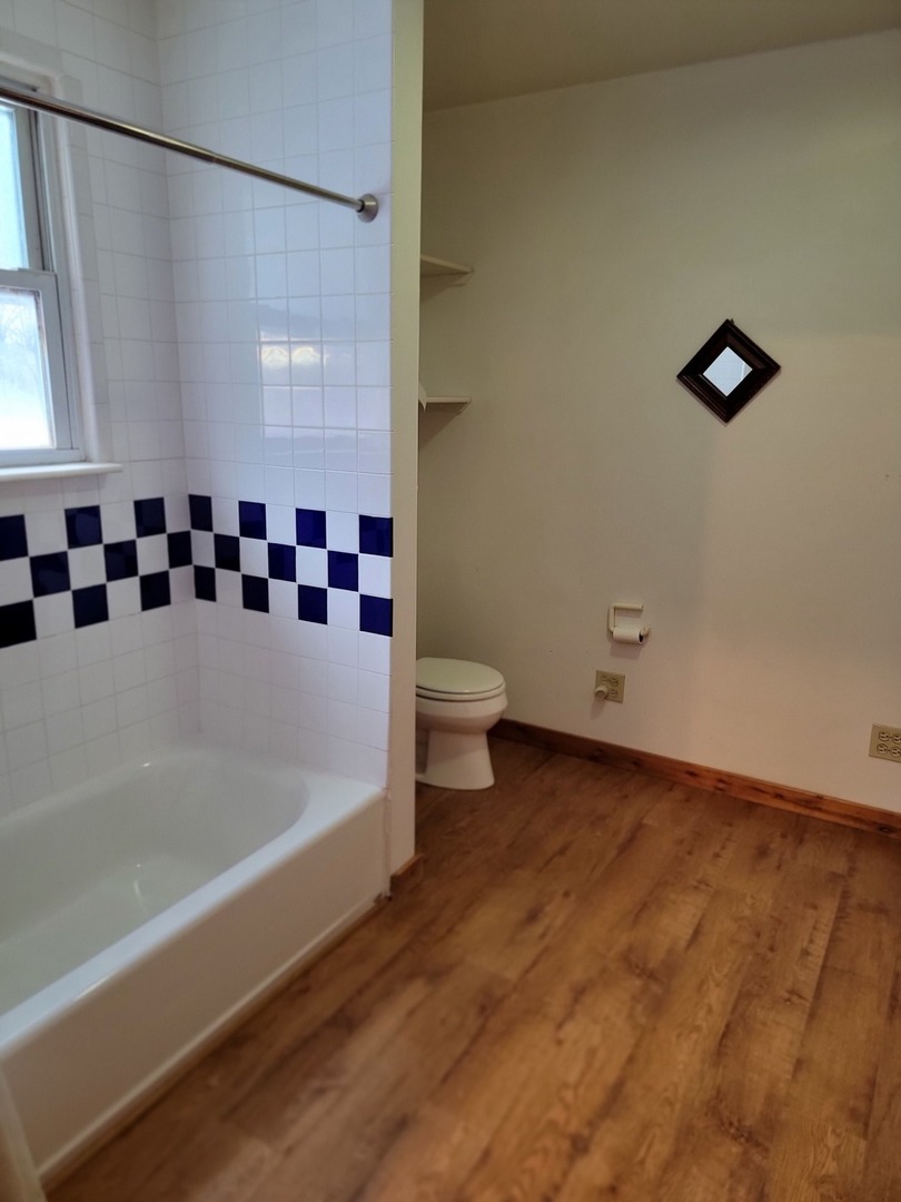 63 West Richton Road Steger, IL 60475 - Photo 41 of 48 a bathroom with a bathtub and shower