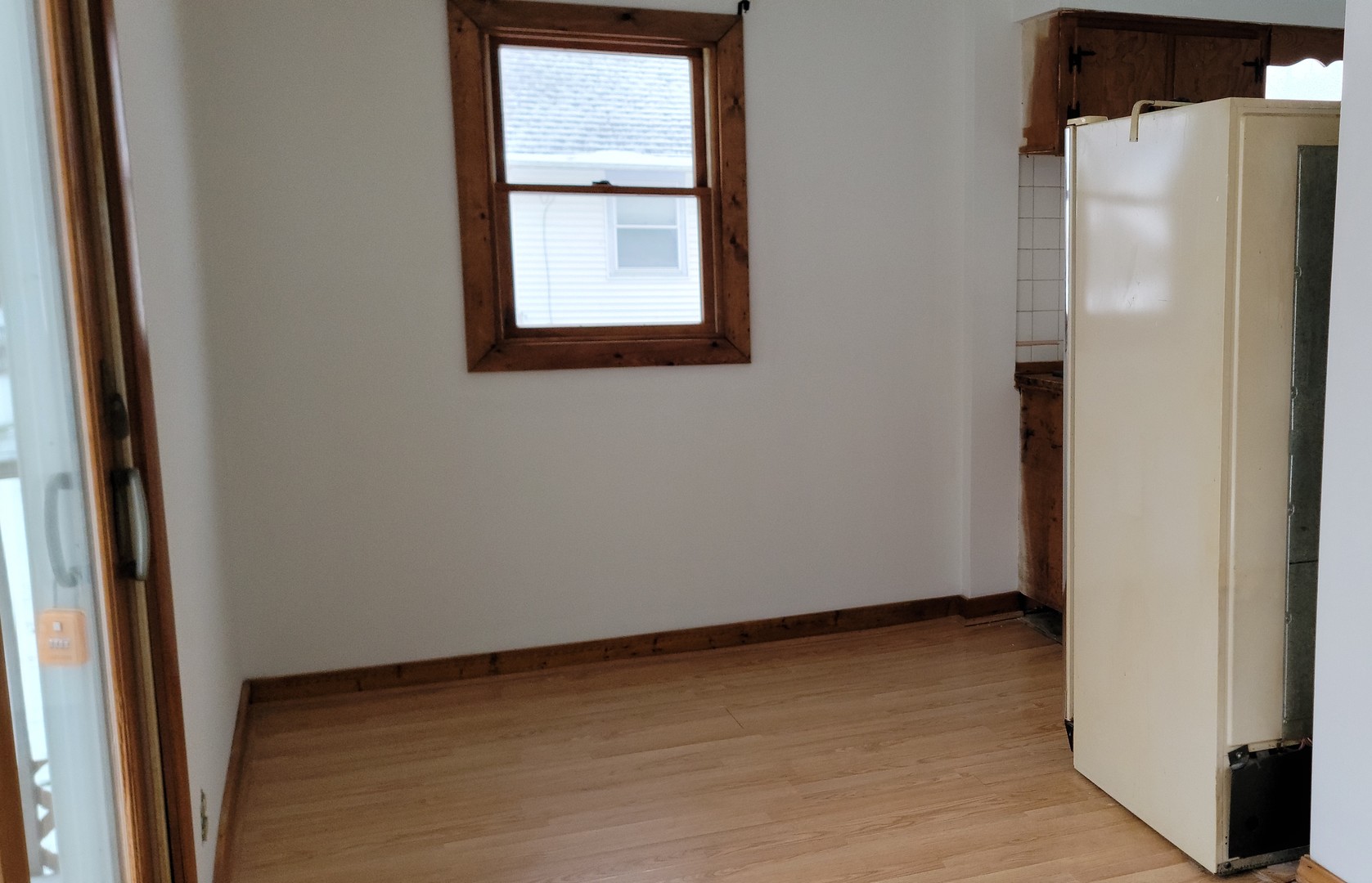 63 West Richton Road Steger, IL 60475 - Photo 8 of 48 a view of an empty room with wooden floor and a window