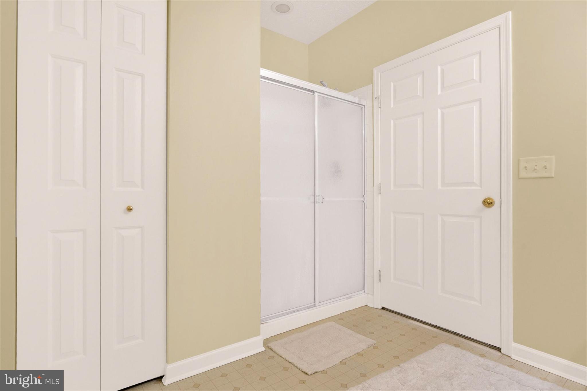 5497 Glenthorne Court, Unit 5497 Rosedale, MD 21237 - Photo 16 of 25 And walk-in shower w/seating bench