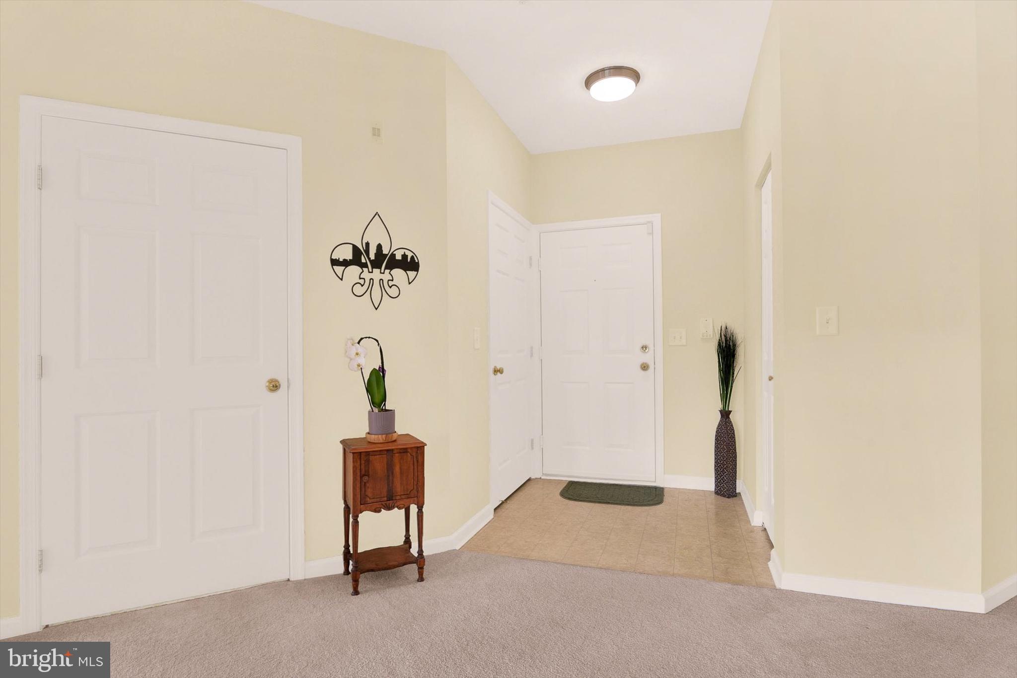 5497 Glenthorne Court, Unit 5497 Rosedale, MD 21237 - Photo 20 of 25 Check out all the storage in the foyer closets!