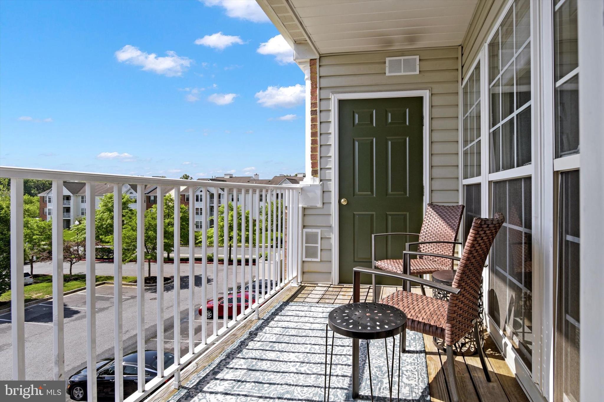 5497 Glenthorne Court, Unit 5497 Rosedale, MD 21237 - Photo 9 of 25 The covered balcony is the perfect spot to relax!