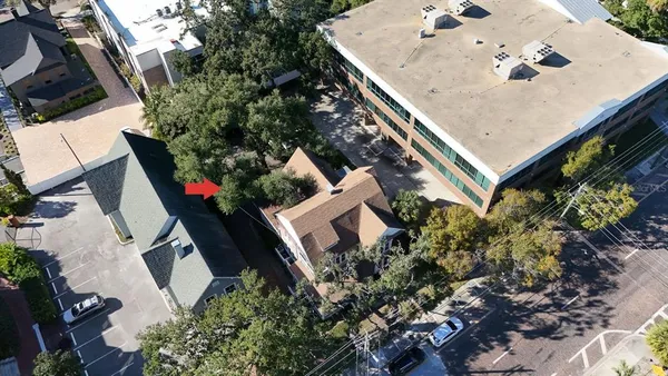 an aerial view of a house with balcony