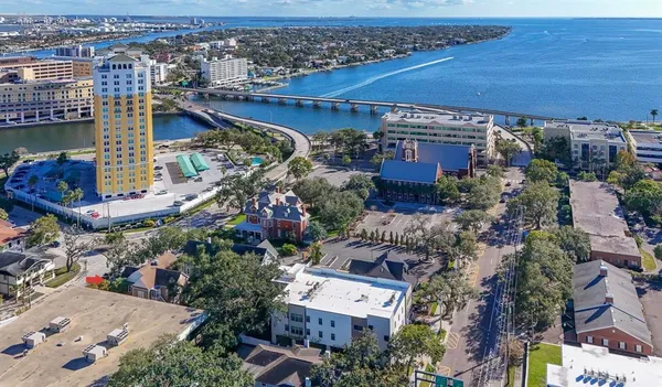 an aerial view of a house with a garden