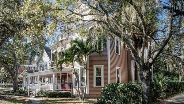 a view of a building with a garden