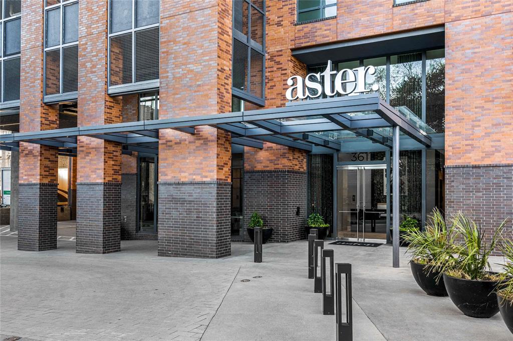 3611 Congress Avenue, Unit 2107 Dallas, TX 75219 - Photo 1 of 1 a view of a building with a potted plant