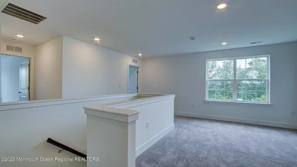 a view of a kitchen with a sink and dishwasher