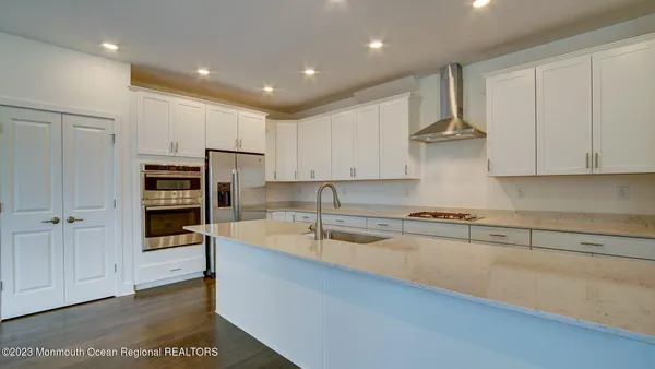 a large kitchen with cabinets