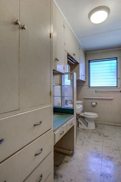 8595 Elepaio Road Kekaha, HI 96752 - Photo 16 of 25 a bathroom with a double vanity sink toilet and shower