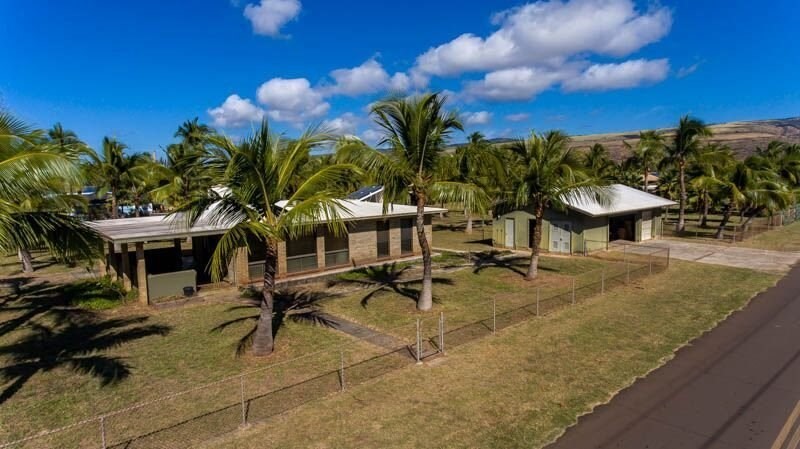 8595 Elepaio Road Kekaha, HI 96752 - Photo 21 of 25 a view of a backyard with a patio