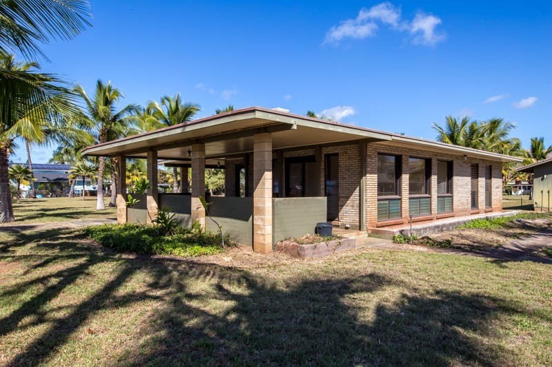 8595 Elepaio Road Kekaha, HI 96752 - Photo 6 of 25 a view of a house with a garden
