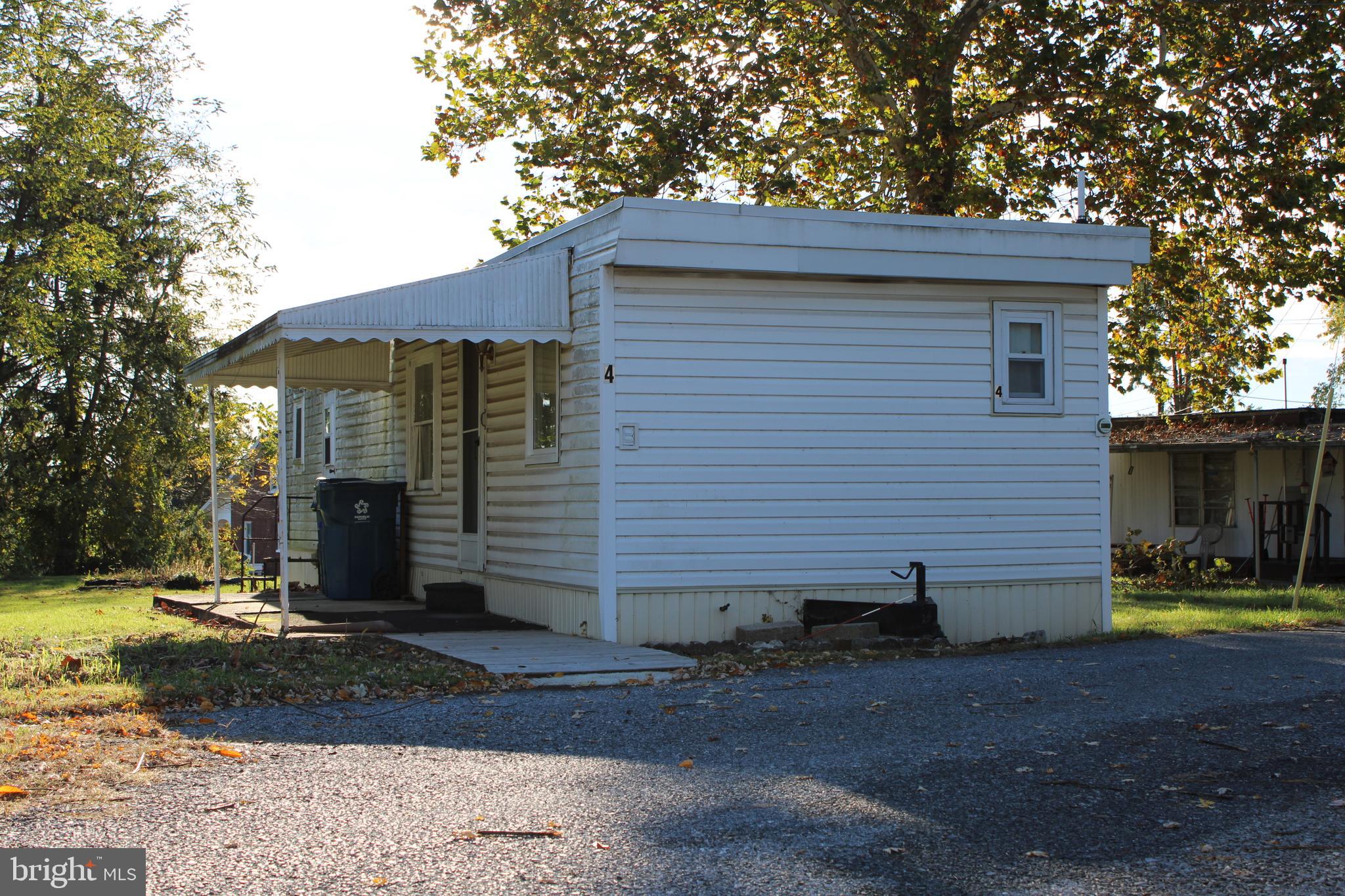 a view of a back yard of the house