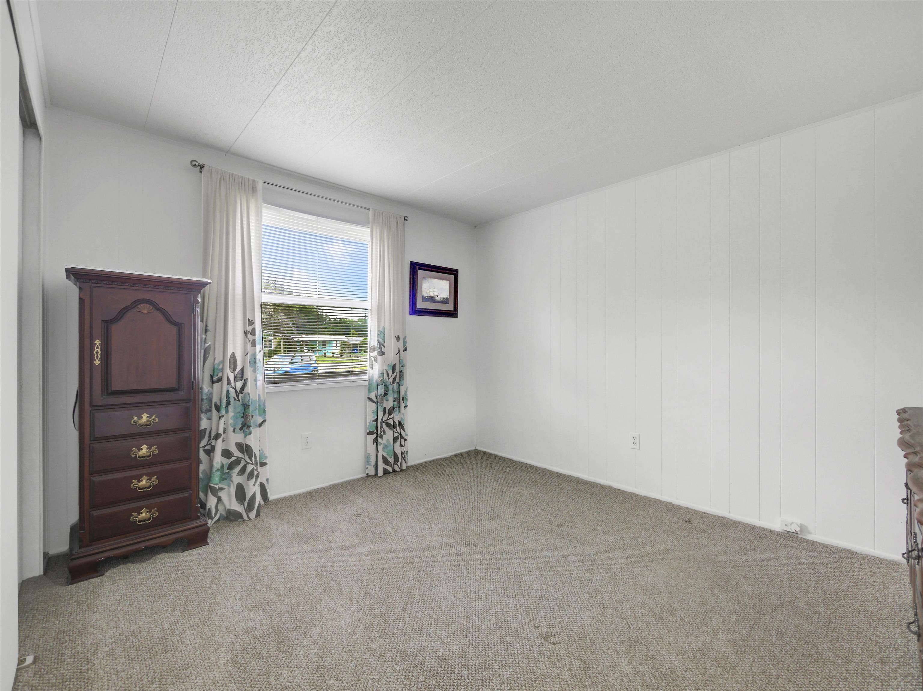 879 Palermo Road St. Augustine, FL 32086 - Photo 16 of 38 a room with window and furniture