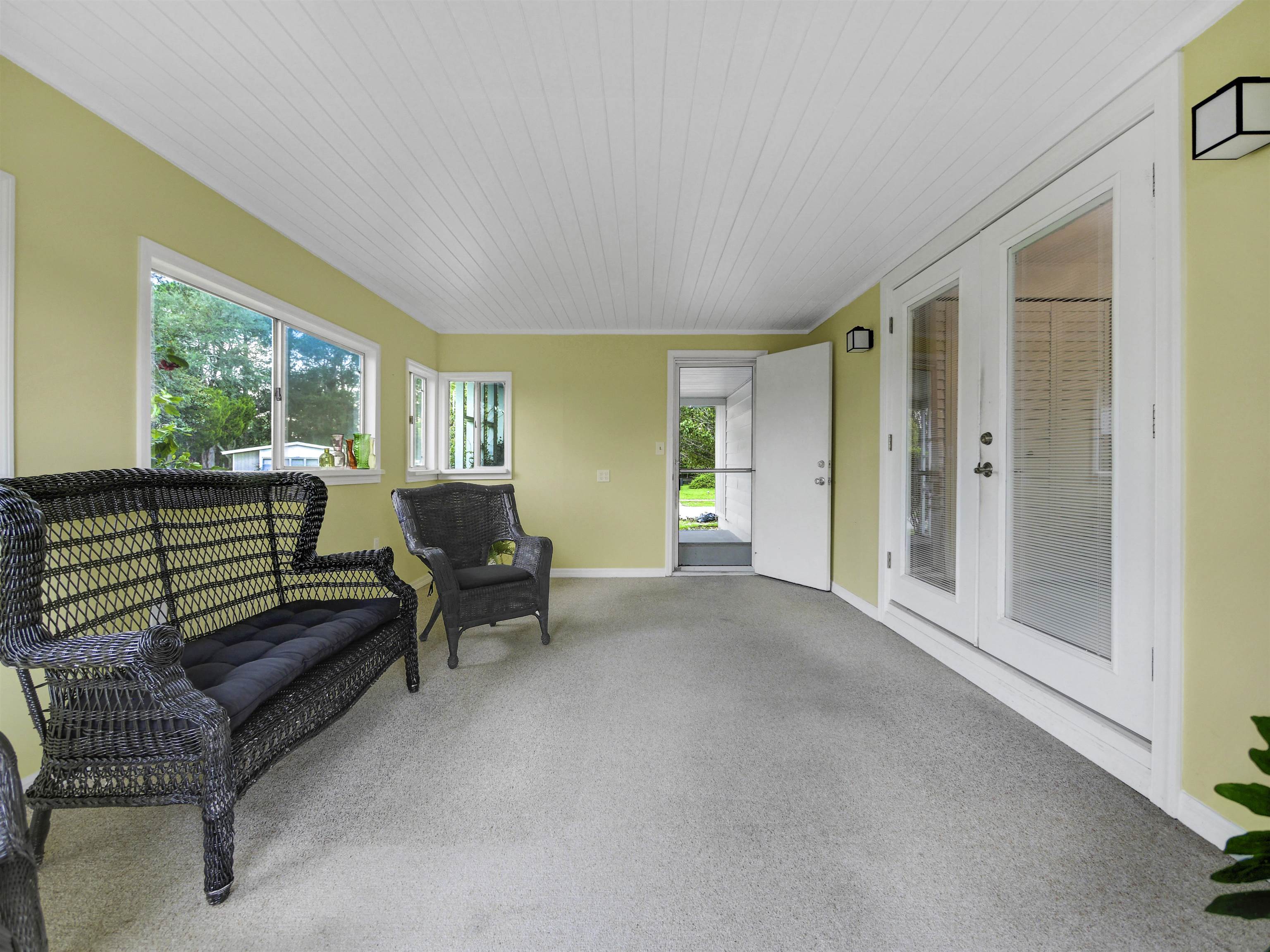 879 Palermo Road St. Augustine, FL 32086 - Photo 20 of 38 a living room with furniture and a fireplace