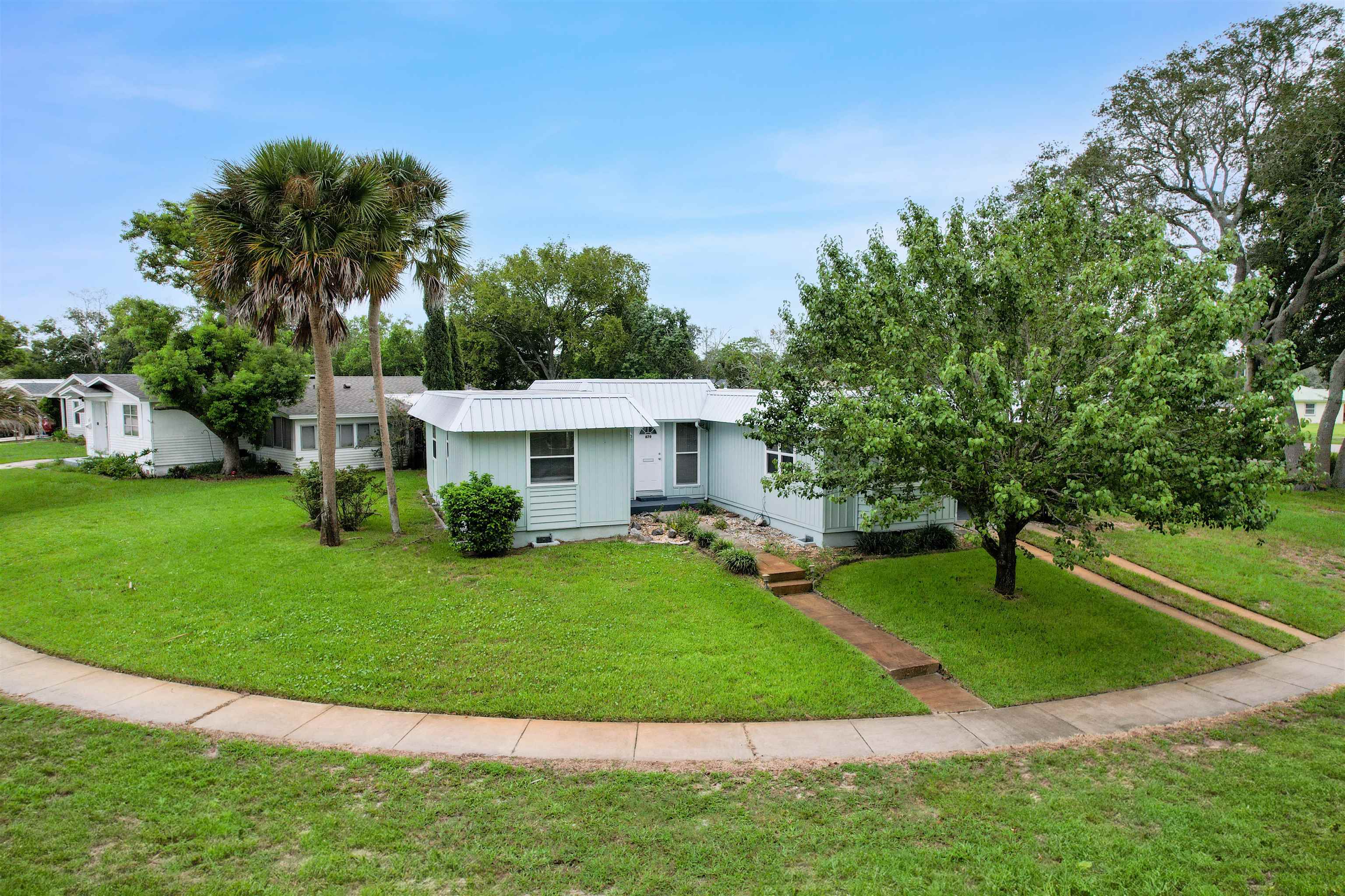 879 Palermo Road St. Augustine, FL 32086 - Photo 27 of 38 a view of a house with a yard porch and sitting area