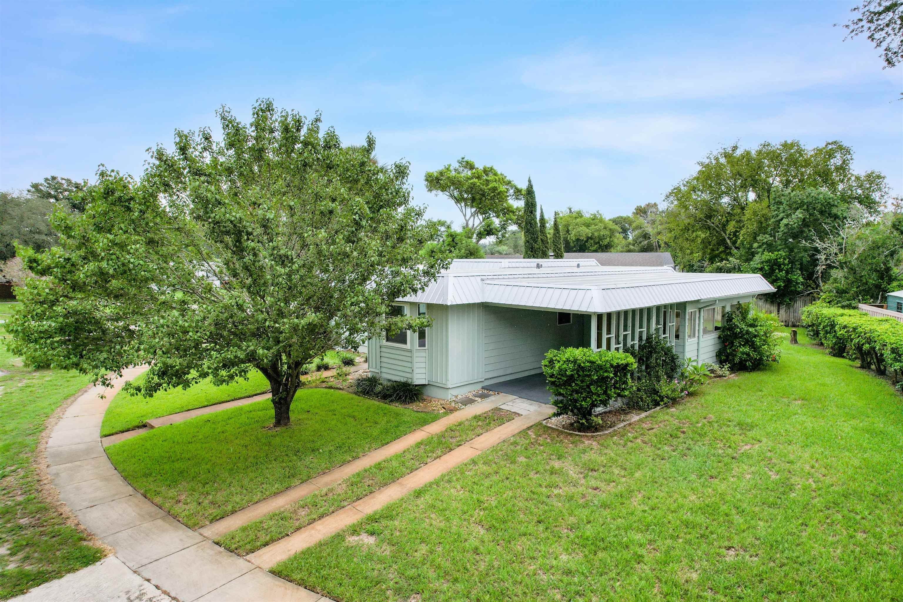 879 Palermo Road St. Augustine, FL 32086 - Photo 28 of 38 a view of a house with a yard