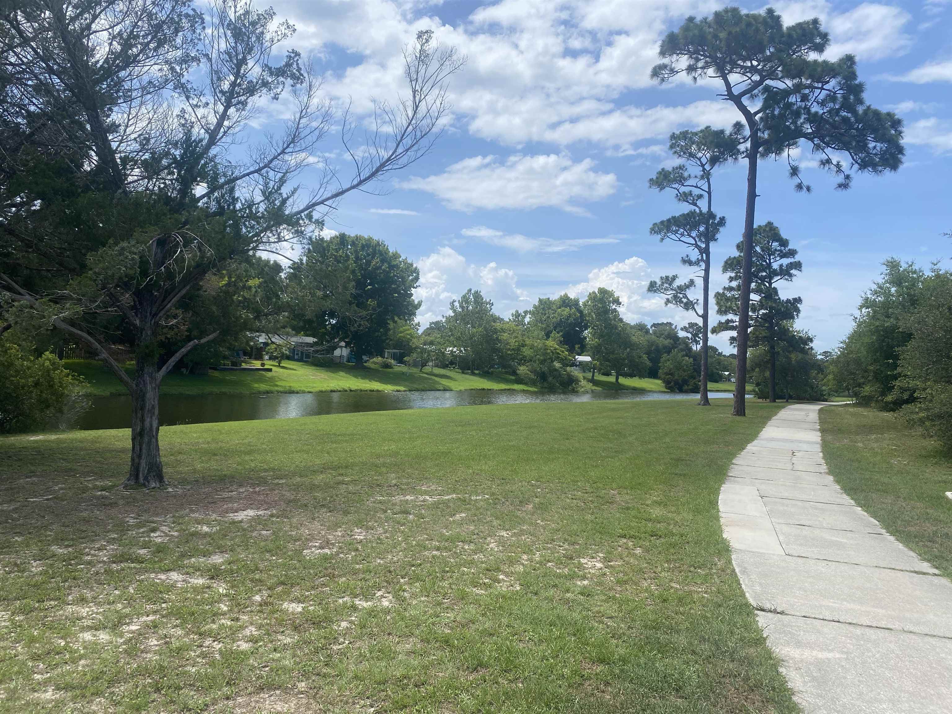 879 Palermo Road St. Augustine, FL 32086 - Photo 36 of 38 a view of a golf course with a lake view