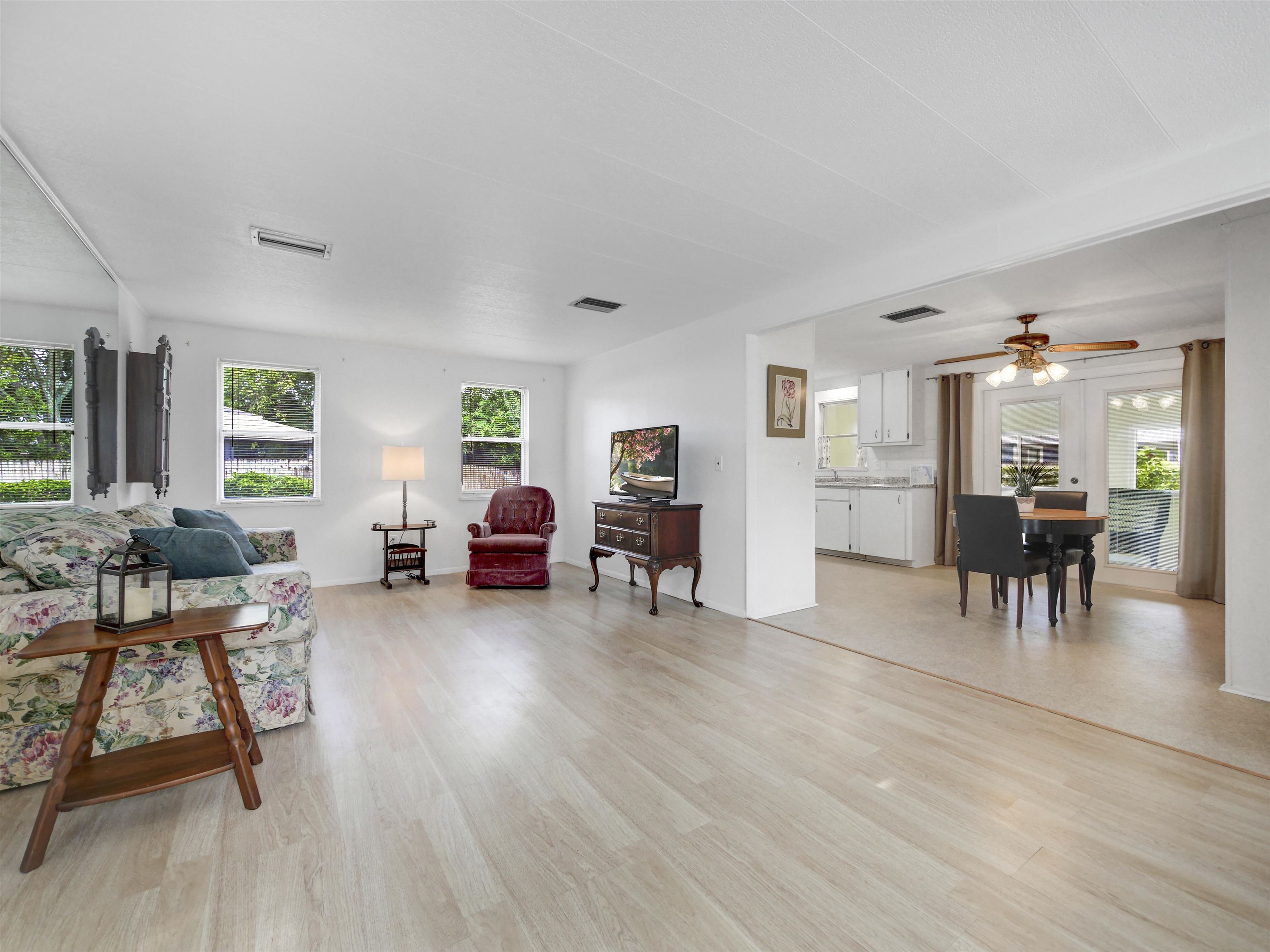 879 Palermo Road St. Augustine, FL 32086 - Photo 5 of 38 a living room with furniture and a wooden floor