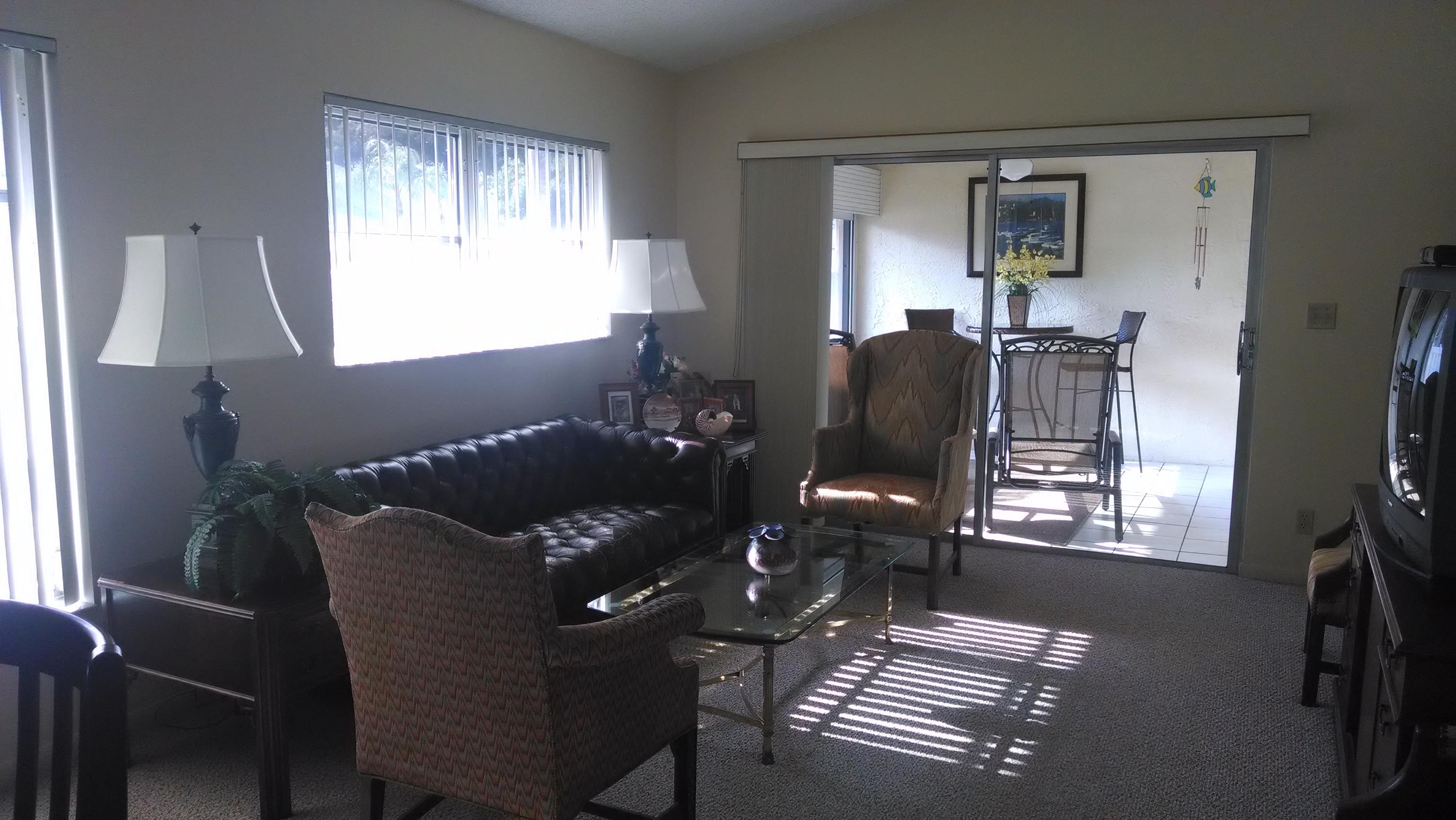 8959 Sunscape Lane Boca Raton, FL 33496 - Photo 6 of 8 Living Room facing inside Florida Room