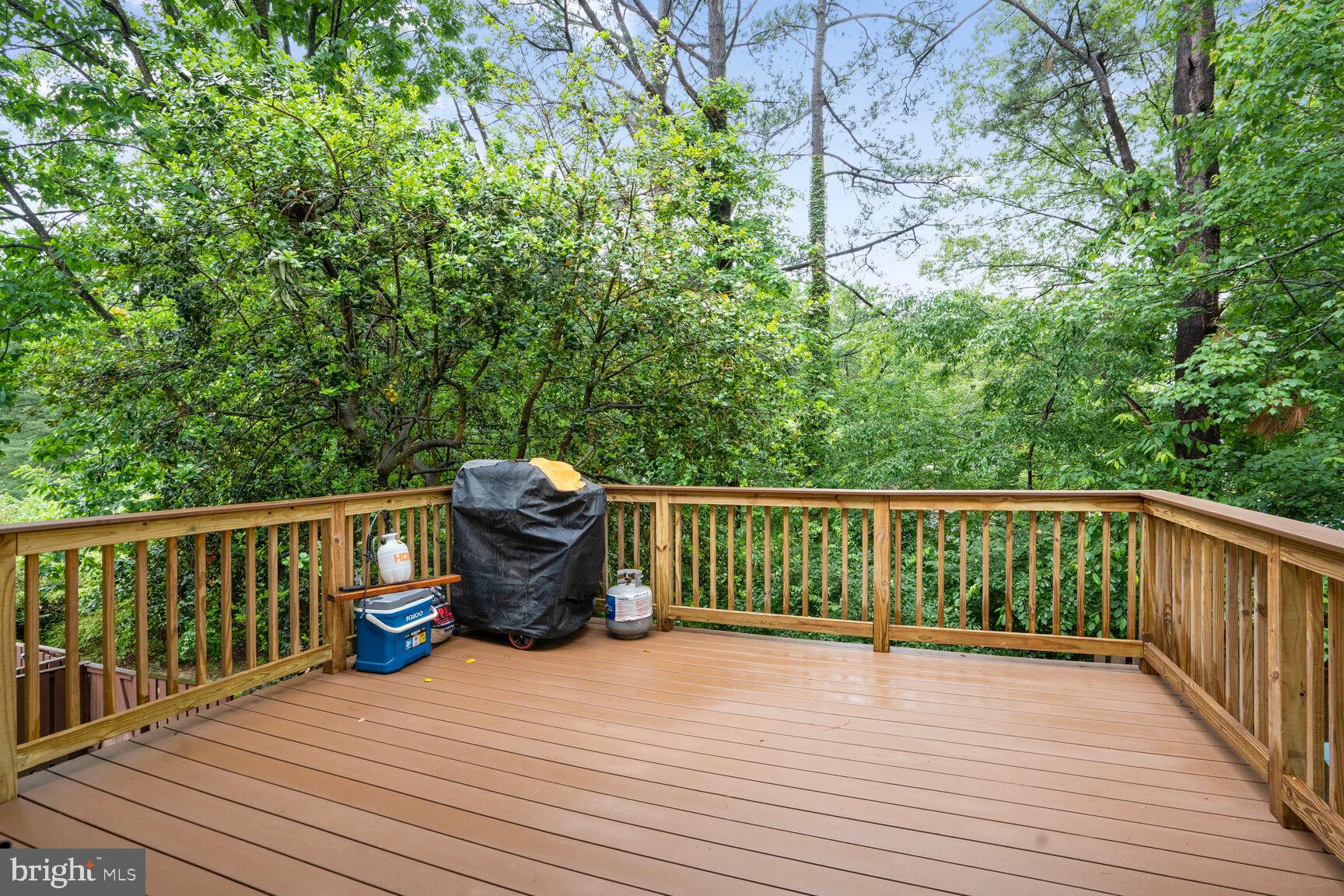2412 Southgate Square Reston, VA 20191 - Photo 15 of 34 a deck view with wooden floor and fence