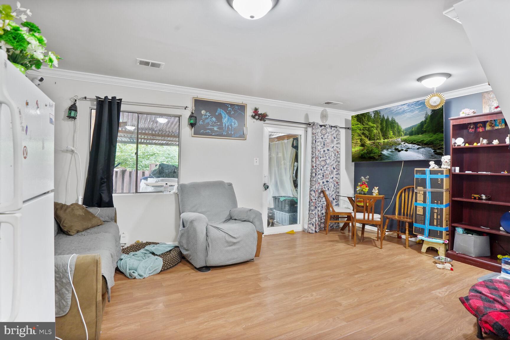 2412 Southgate Square Reston, VA 20191 - Photo 22 of 34 a living room with furniture and a fireplace