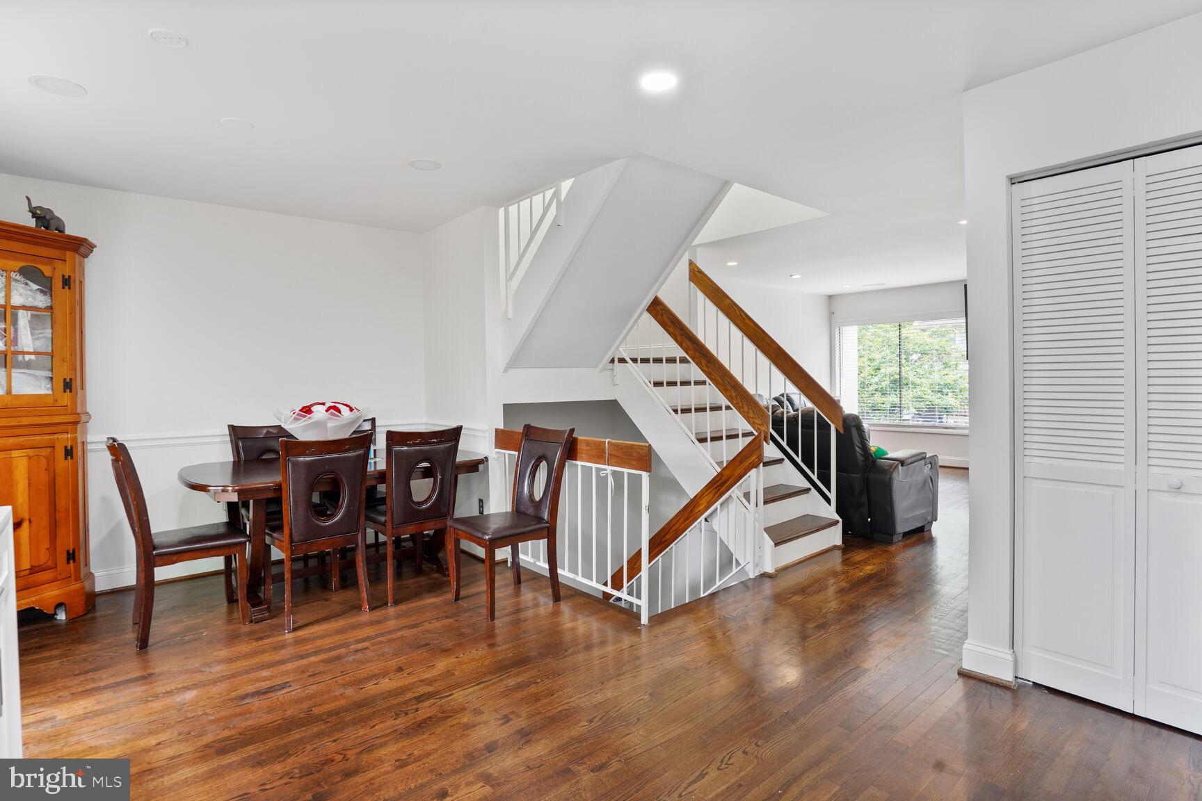 2412 Southgate Square Reston, VA 20191 - Photo 7 of 34 a view of a dining room with furniture and wooden floor