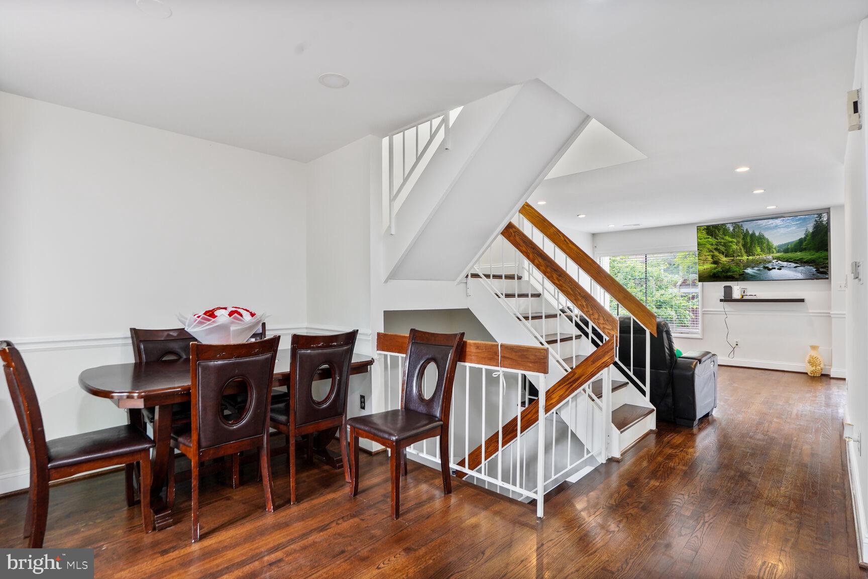 2412 Southgate Square Reston, VA 20191 - Photo 8 of 34 a dining room with furniture and wooden floor