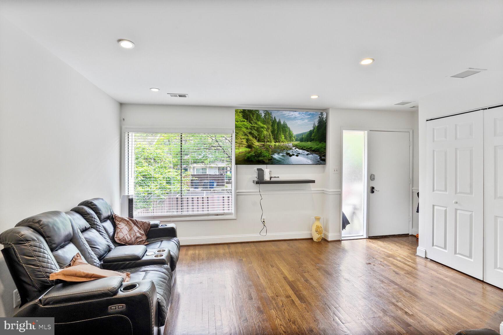 2412 Southgate Square Reston, VA 20191 - Photo 10 of 34 a living room with furniture and a large window