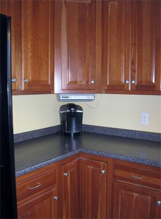 253 County Road Rochester, MA 02770 - Photo 13 of 30 a kitchen with a sink and cabinets