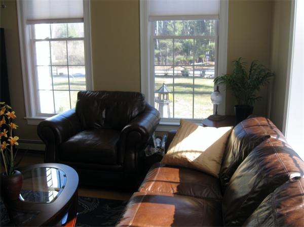 253 County Road Rochester, MA 02770 - Photo 17 of 30 a living room with furniture and a large window