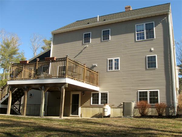 253 County Road Rochester, MA 02770 - Photo 20 of 30 a view of a house with a window and a fireplace