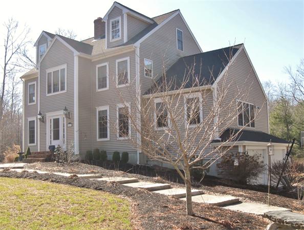 253 County Road Rochester, MA 02770 - Photo 2 of 30 a front view of a house with a yard