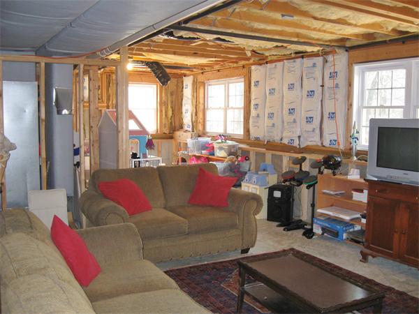 253 County Road Rochester, MA 02770 - Photo 24 of 30 a living room with furniture a flat screen tv and a window