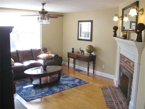 253 County Road Rochester, MA 02770 - Photo 4 of 30 a living room with furniture and a fireplace