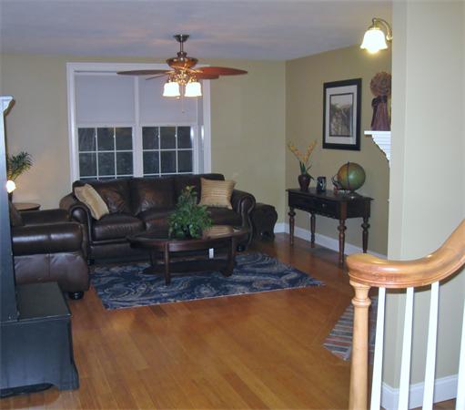 253 County Road Rochester, MA 02770 - Photo 5 of 30 a living room with furniture a window and a fireplace