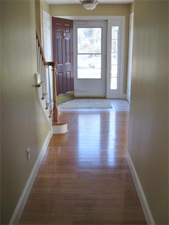 253 County Road Rochester, MA 02770 - Photo 6 of 30 a view of entryway with wooden floor and a window