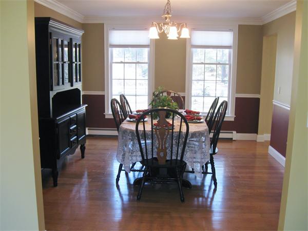 253 County Road Rochester, MA 02770 - Photo 7 of 30 a view of a dining room with furniture window and wooden floor